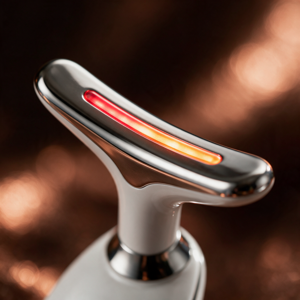 Macro detail of the Luxen Sculpt & Glow Wand LED treatment head