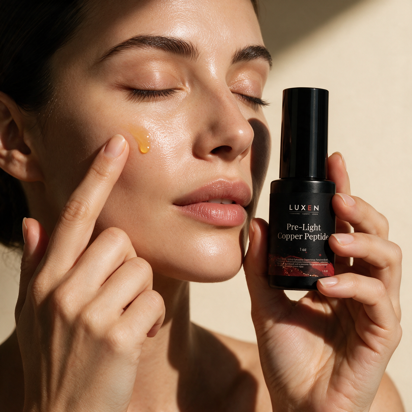 Applying PRE-LIGHT Copper Peptide Serum before red light therapy