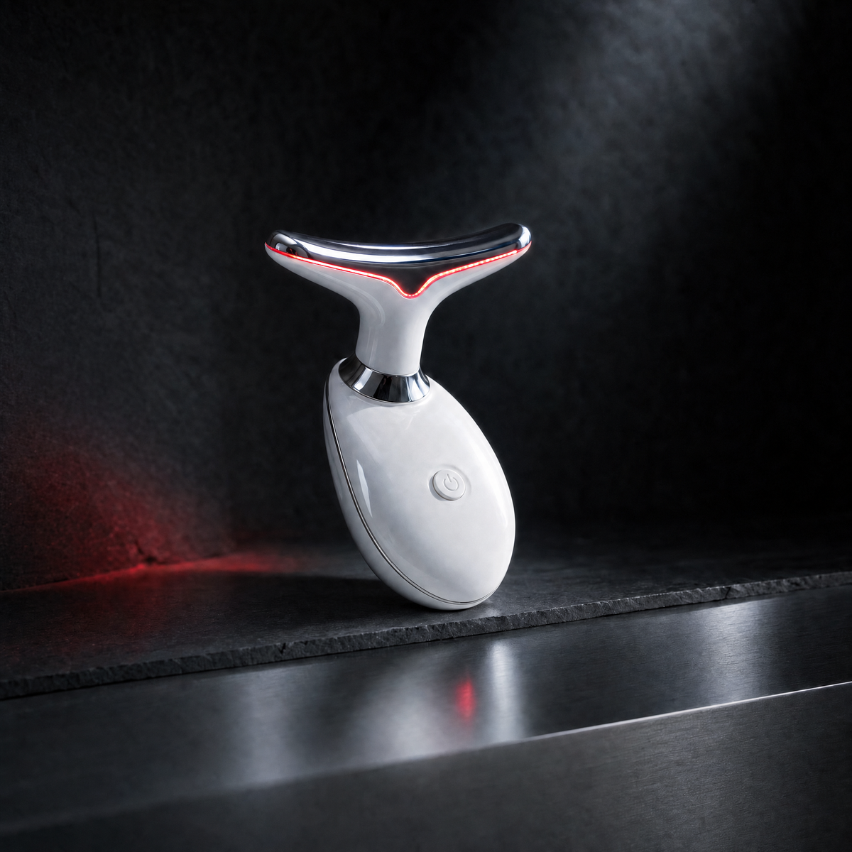 Luxen Sculpt & Glow Wand resting on a steel ledge in a dark studio