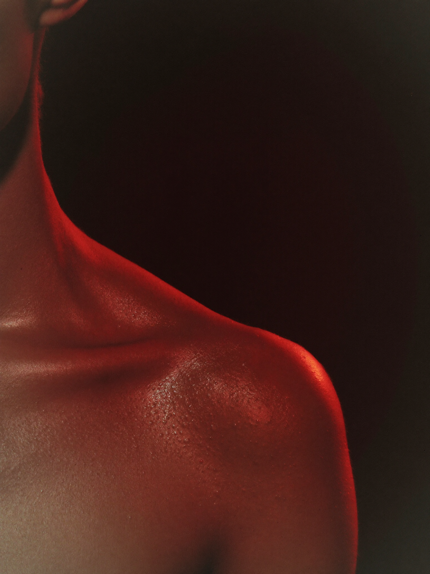 Skin in red light — editorial