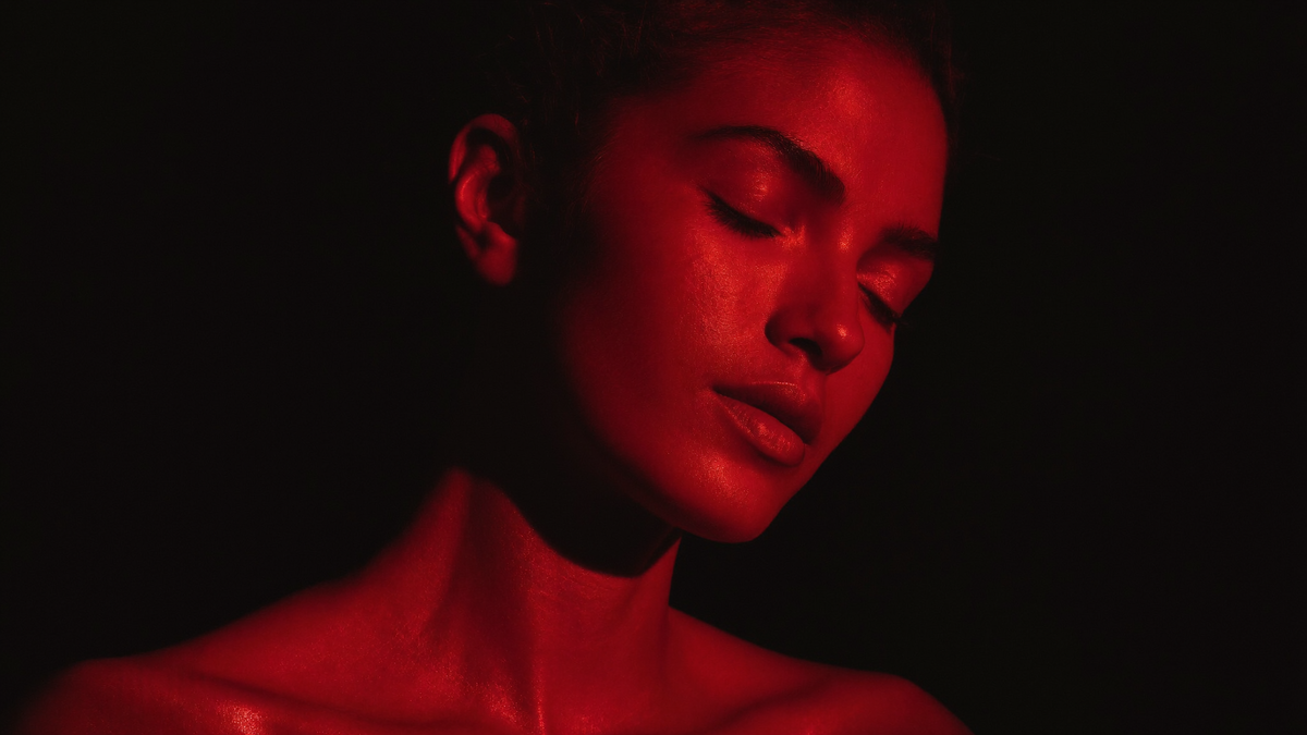 Face in red light — home hero slide