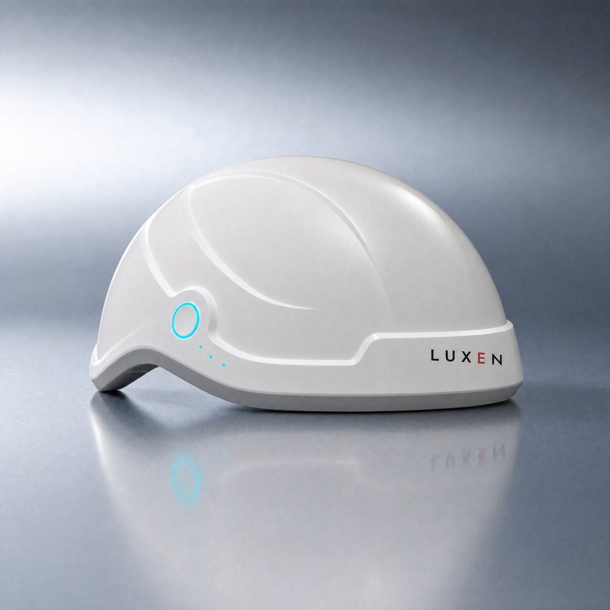 Luxen Laser Cap on a steel-grey studio background