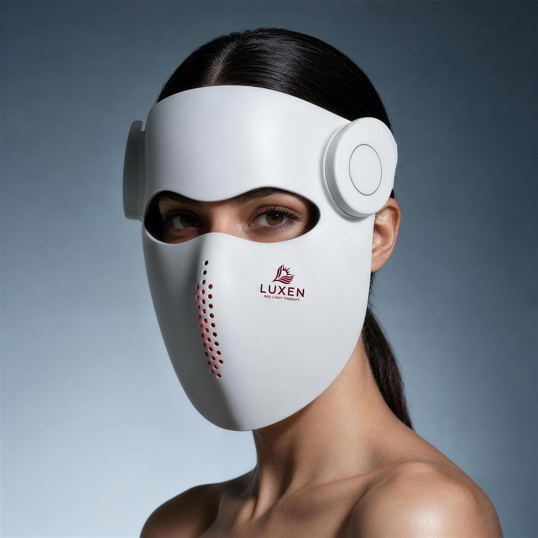 Woman wearing the white Luxen Veil light therapy mask